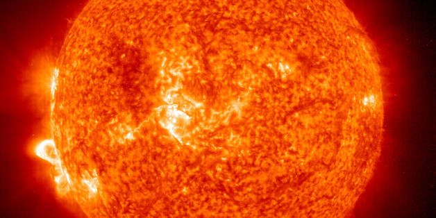 Post-Flare Loops Erupt From Suns Surface